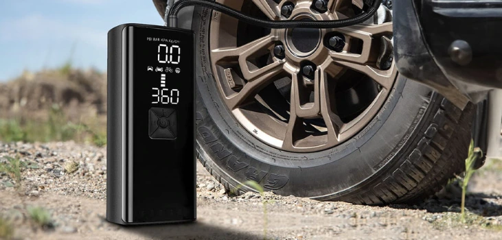 Auto Air next to car wheel outdoors